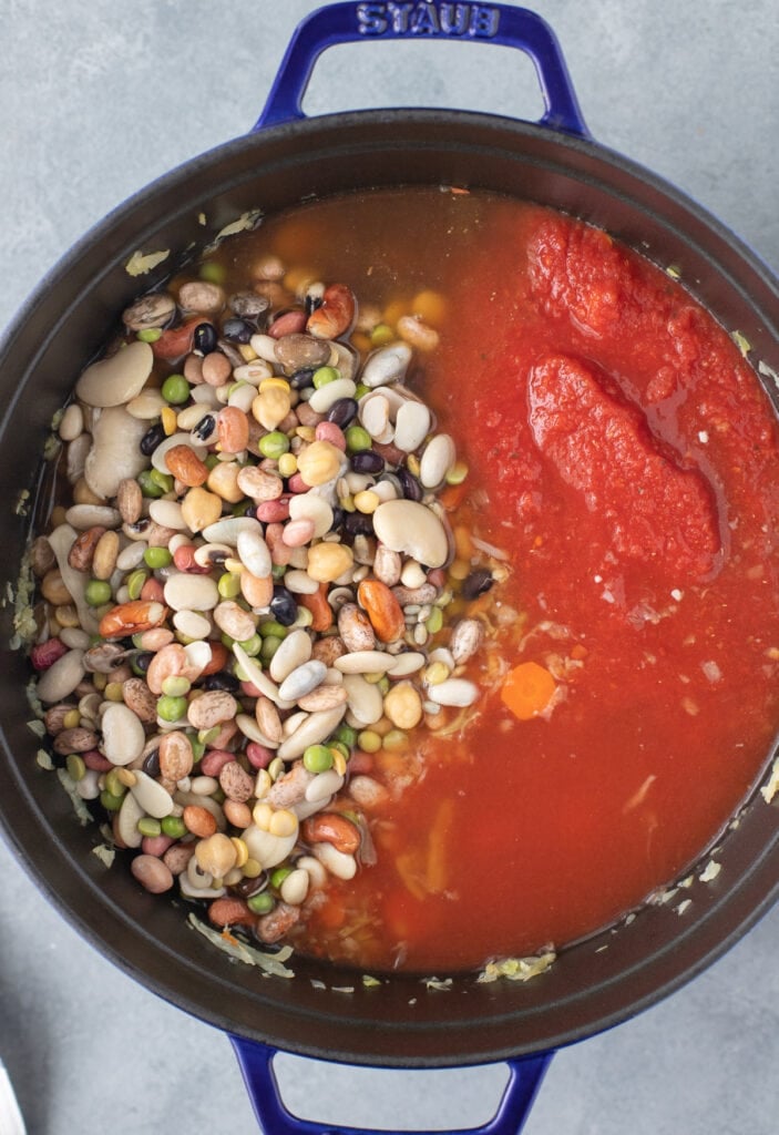 All ingredients for 15 bean soup in a large pot before being mixed or cooked