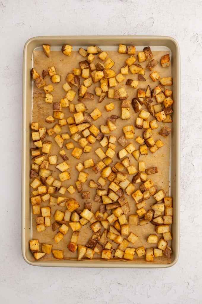 Roasted Breakfast Potatoes on a parchment lined baking sheet.