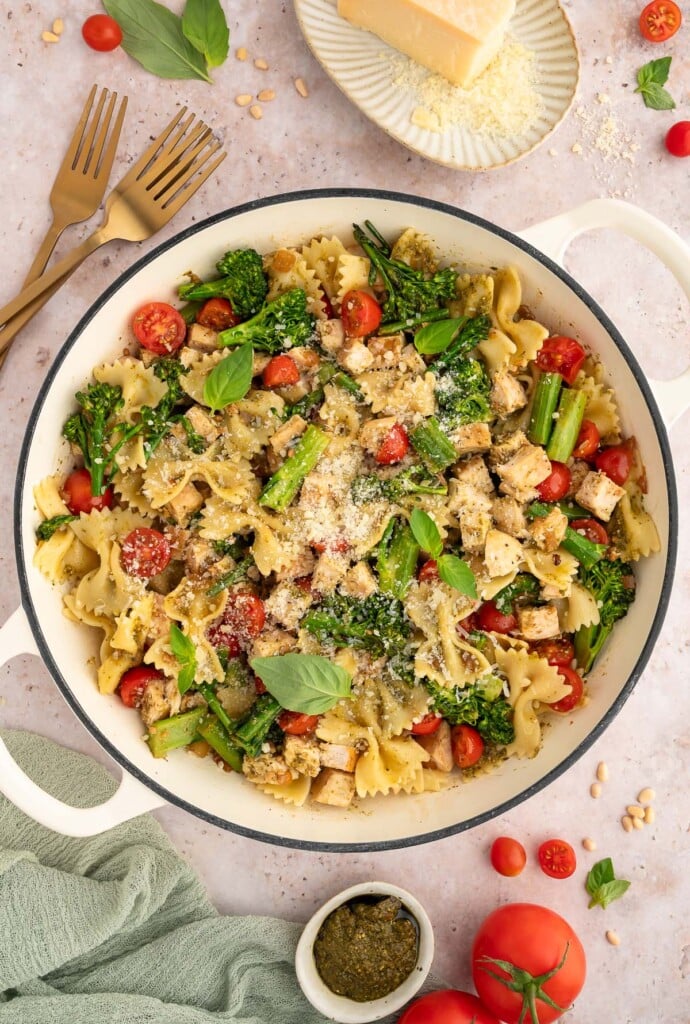 An overhead shot of a dutch oven with chicken veggie pasta.