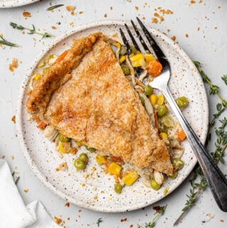 Healthy Chicken Pot Pie on a white plate with a fork