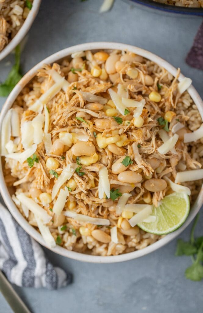 Crockpot White Bean Chicken Chili in a white bowl on a grey background