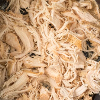 shredded chicken in black crockpot
