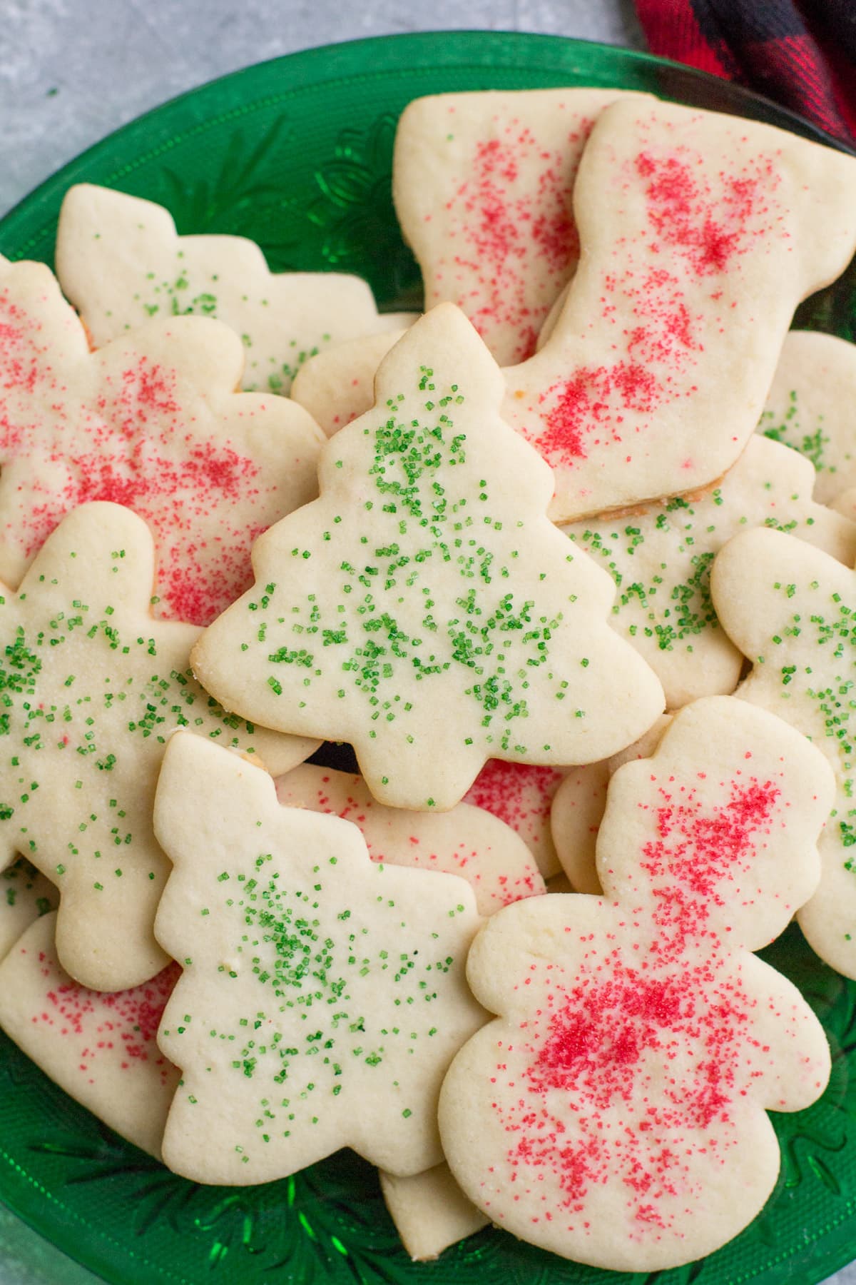 Easy Cut Out Sugar Cookies on a dark green plate