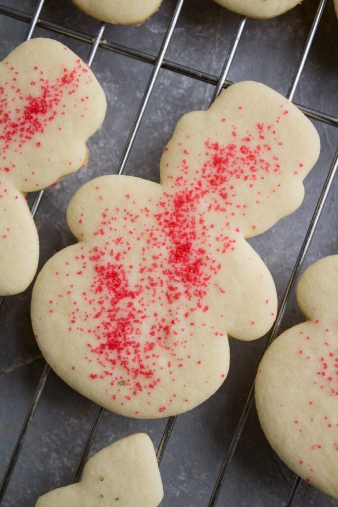 A close up of a snowman cut out sugar cookie