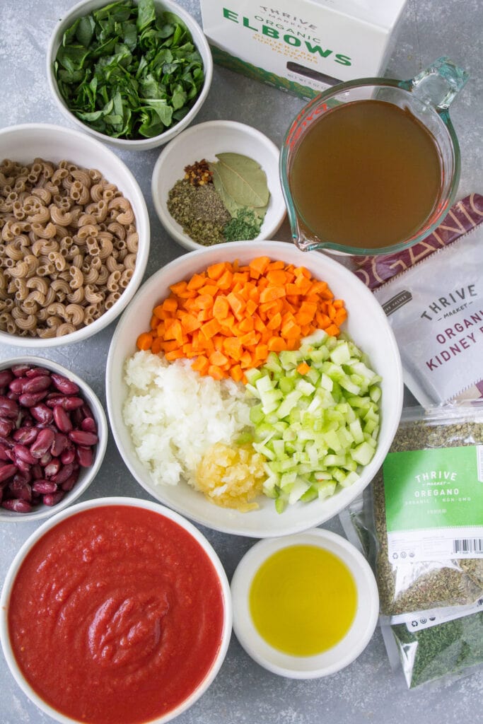 Ingredients for Easy Minestrone Soup in small white bowls.