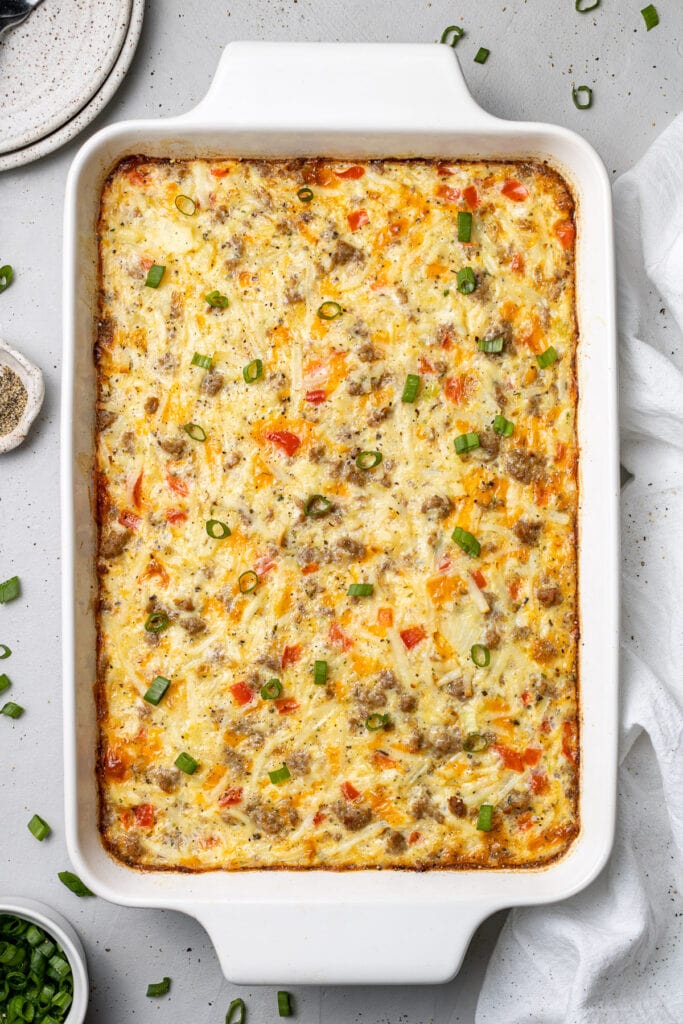 A white baking dish of egg hash brown casserole