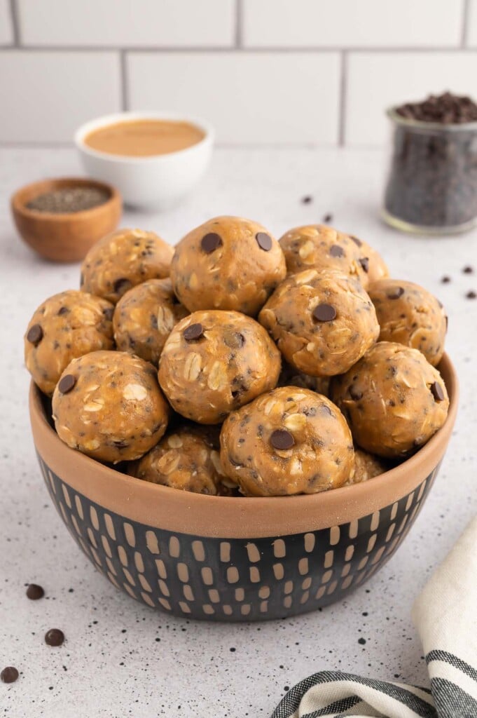 Oatmeal Energy Balls in a large bowl on a white kitchen counter
