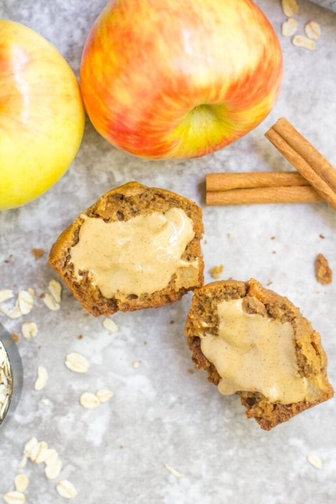 Healthy Apple Recipes - apple cinnamon muffins on a grey background