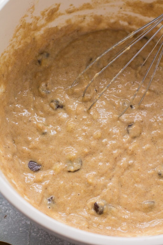 Easy healthy banana muffin batter mixed with chocolate chips