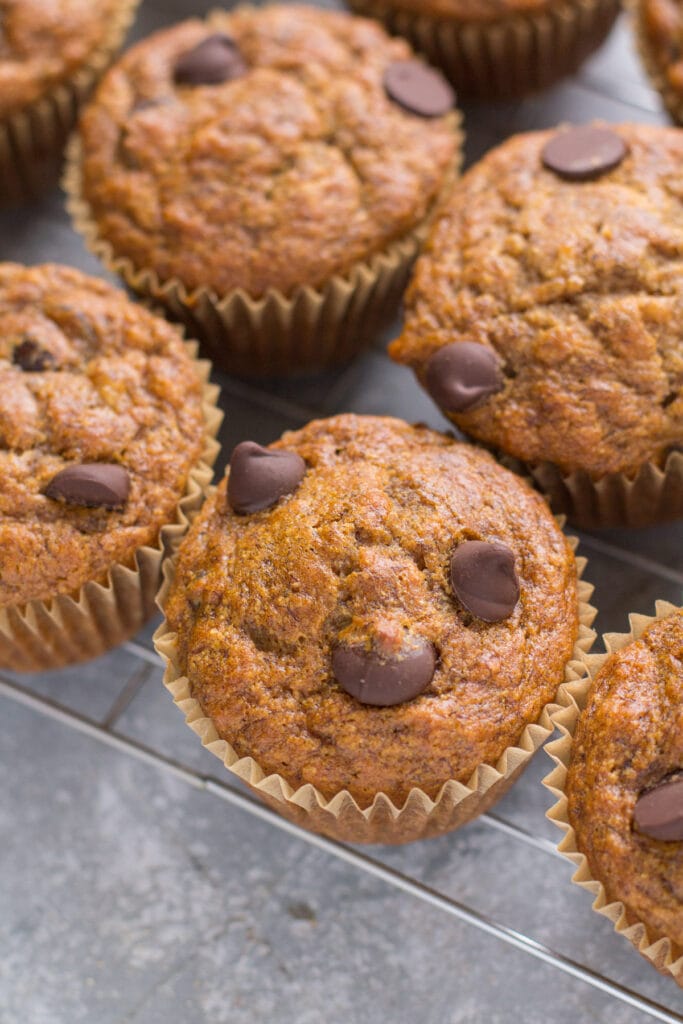 a healthy banana muffin ons a metal baking sheet rack