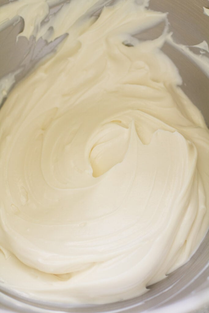 filling for healthy cheesecakes being mixed together in a metal bowl