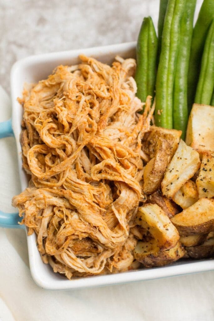 a close up of crockpot pulled pork, a slow cooker dinner recipe