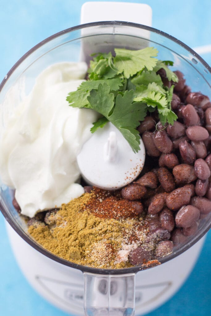 Bean dip in a food processor before being processed together
