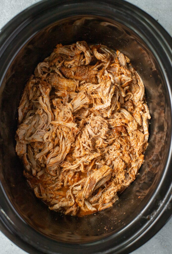 healthy pulled pork in a crockpot base