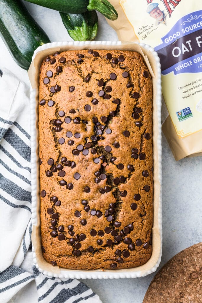 Healthy Zucchini Bread in a white baking dish on a grey background