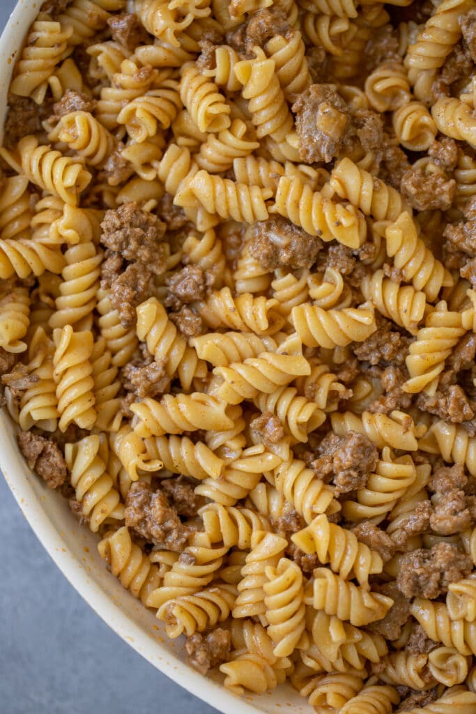 A close up of healthy hamburger helper in a white pan