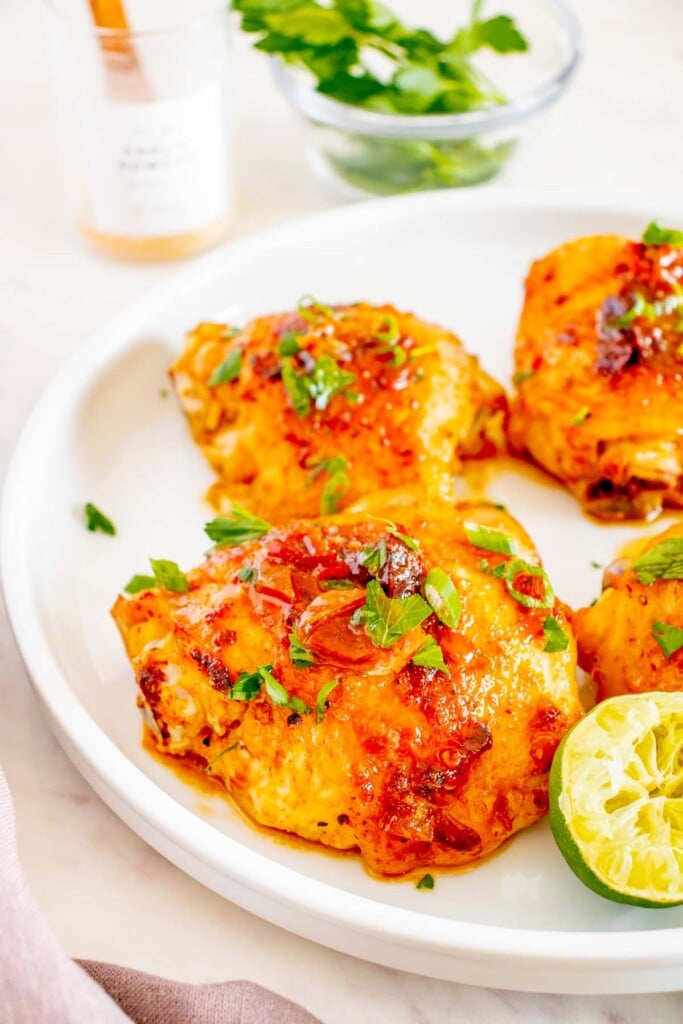 Honey Chipotle Chicken thighs on a white plate