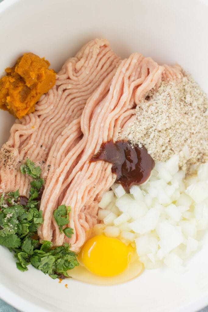 A close up of BBQ meatloaf ingredients in a bowl