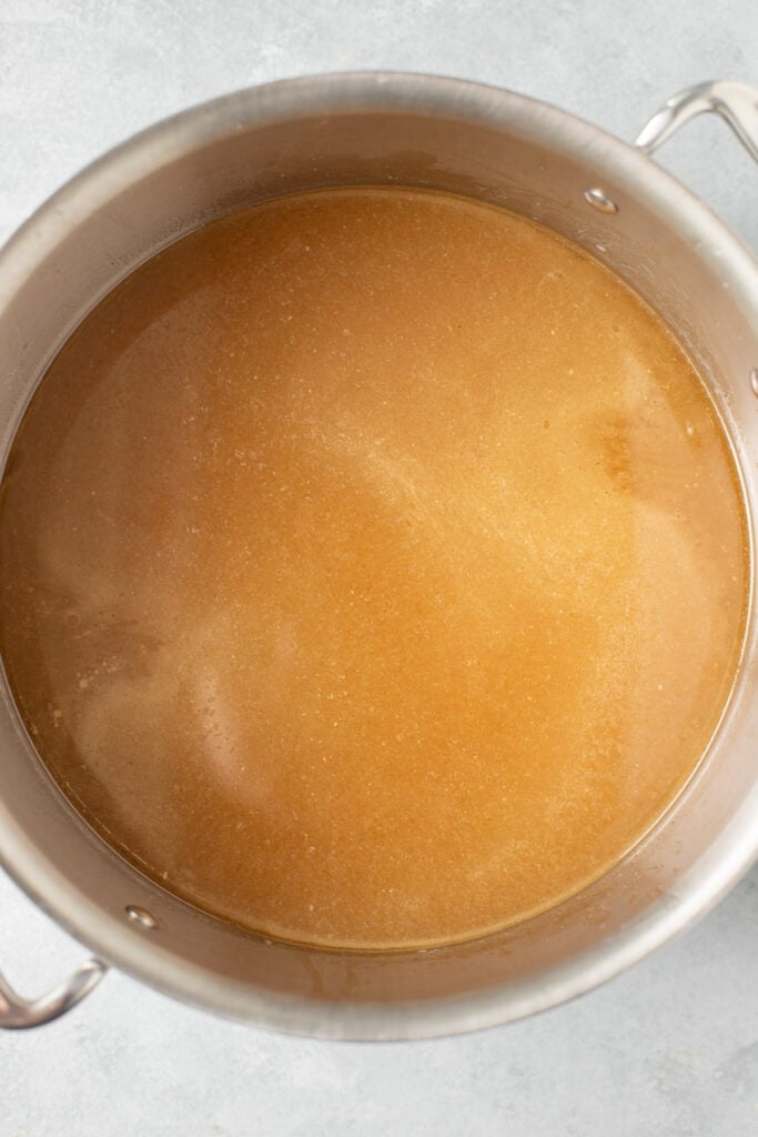 bone broth in a pot after being strained