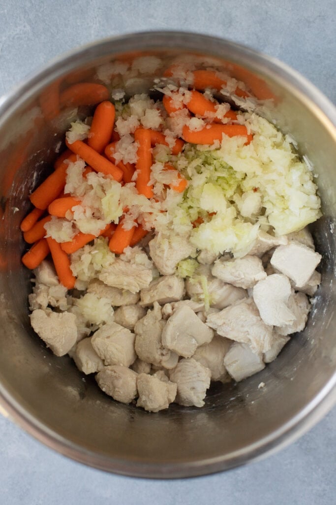 Ingredients for Instant Pot Chicken Stew in the Instant Pot prior to cooking