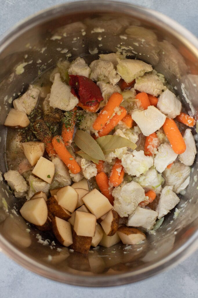 An overhead shot of Ingredients for Instant Pot Chicken Stew in the Instant Pot after cooking