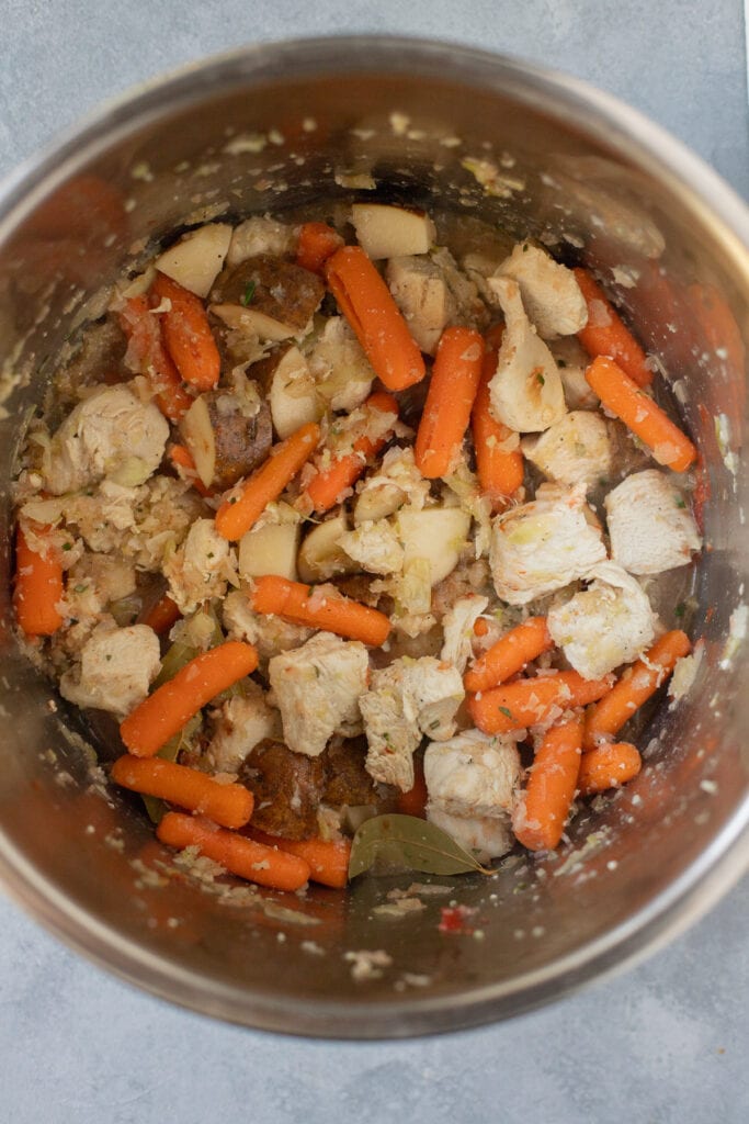 An overhead shot of Ingredients for Instant Pot Chicken Stew in the Instant Pot after cooking without the bay leaves