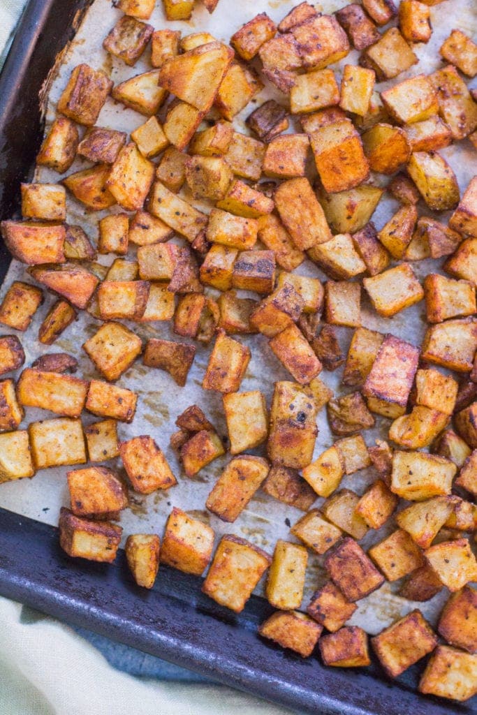 a sheet pan filled with roasted mexican potatoes