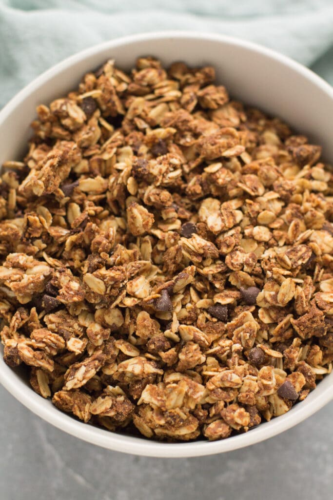 A close up of a bowl of healthy peanut butter granola