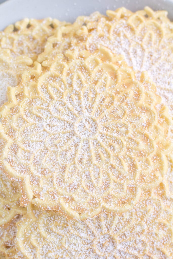 A close up of Pizzelle - a classic Italian cookie