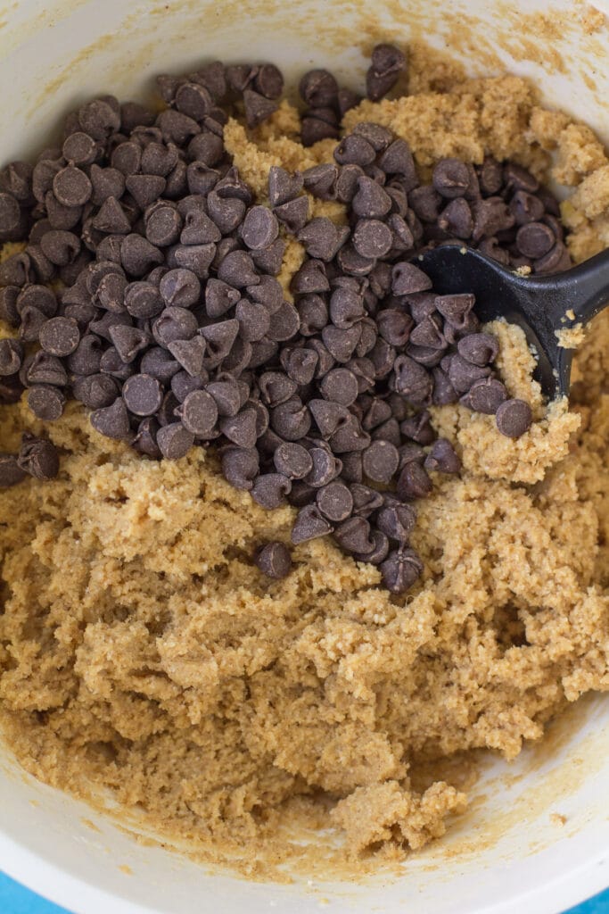 chocolate chip cookies being added into protein cookie dough batter
