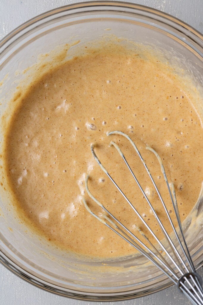 Batter for protein donuts mixed together in a glass bowl