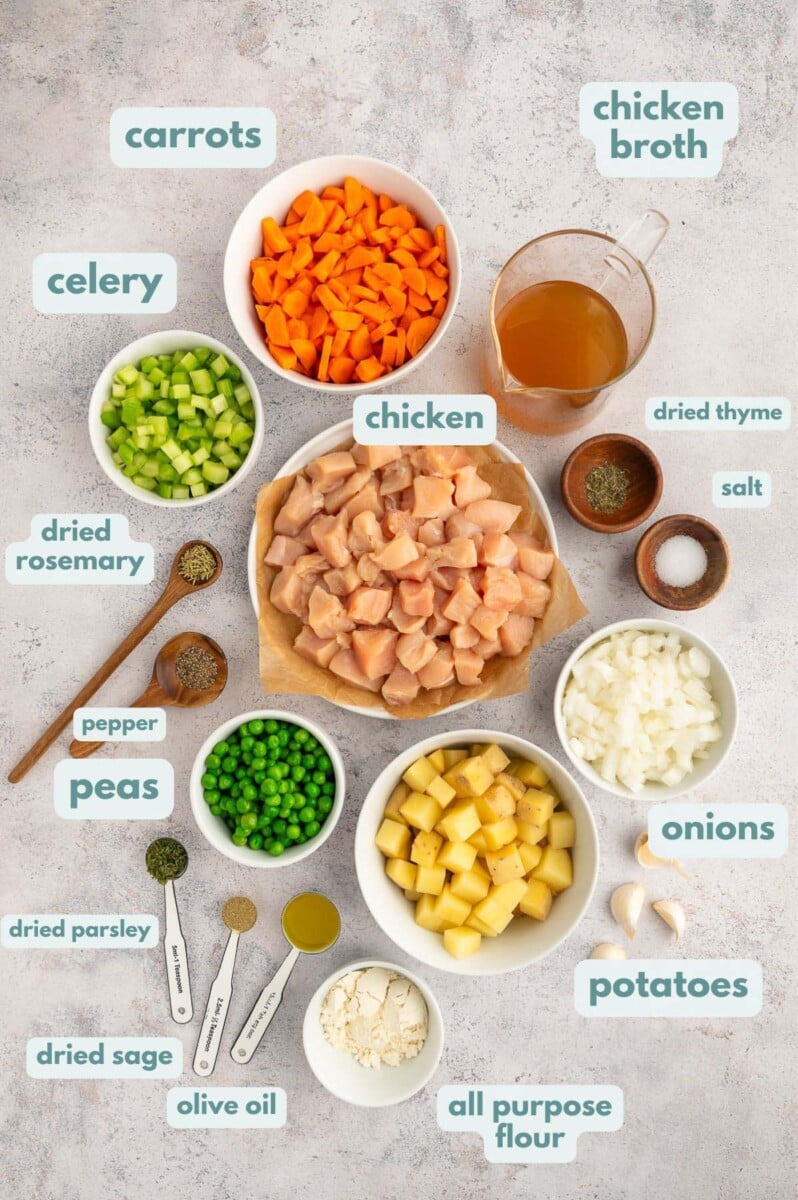 Ingredients for chicken stew in small bowls 