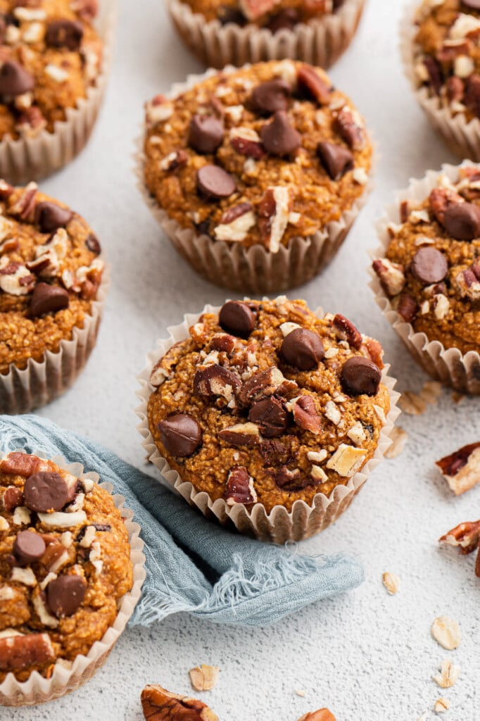 Sweet potato muffins on a white background with a blue cloth on the side