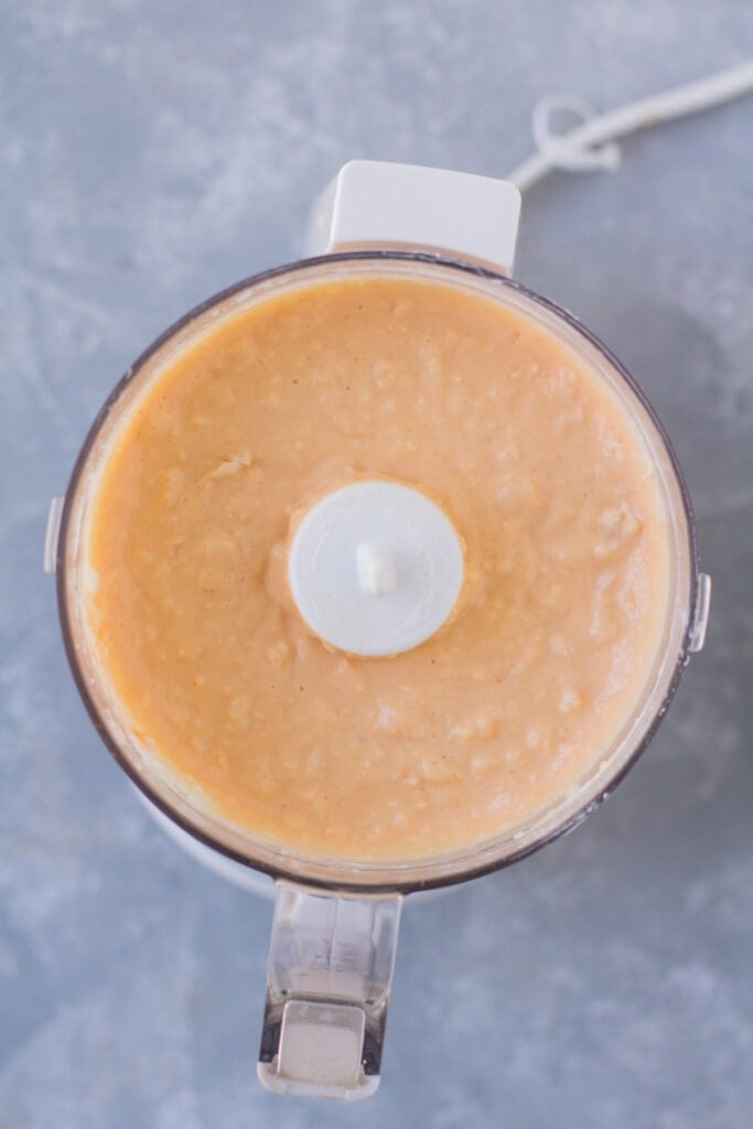 healthy buffalo dip in a food processor being blended together