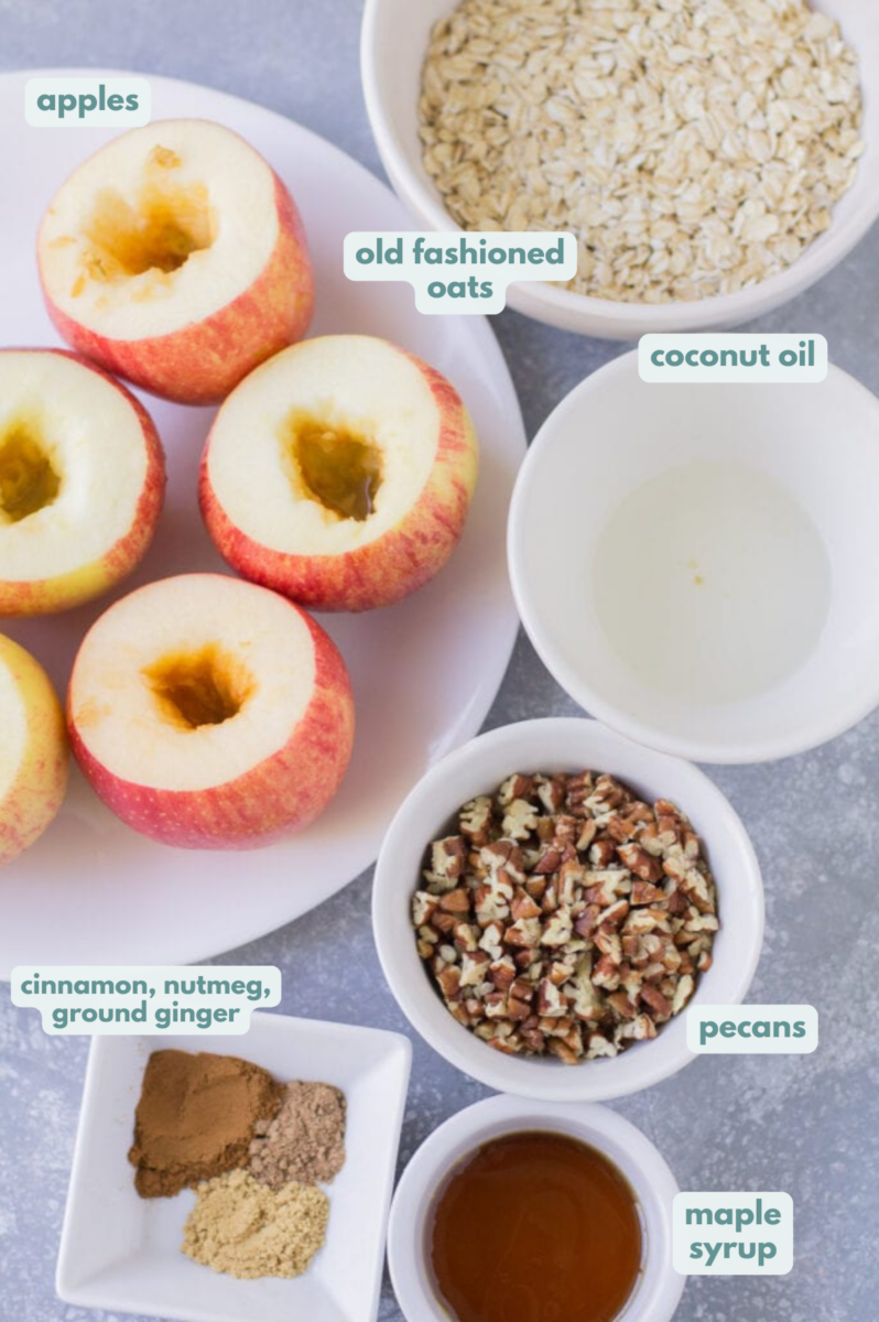 Ingredients for healthy baked apples in small white dishes on a grey background