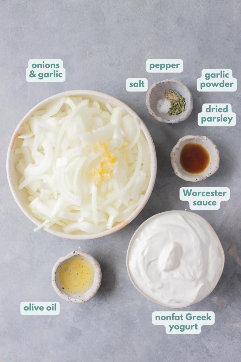 Ingredients for healthy onion dip in white bowls: olive oil, onions, garlic, non fat greek yogurt, worcestershire sauce, dried parsley, garlic powder, salt & pepper